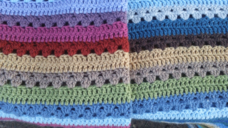 the blankets share 7 common colours and row placement