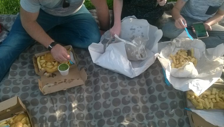 Enjoying a fish and chip picnic