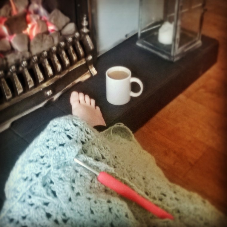 crochet by the fireside.