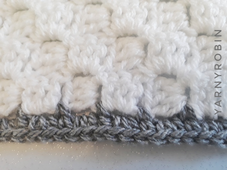 grey and white baby blanket