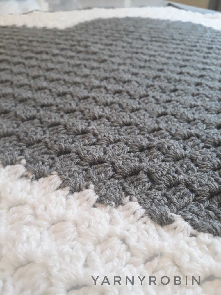 grey and white baby blanket